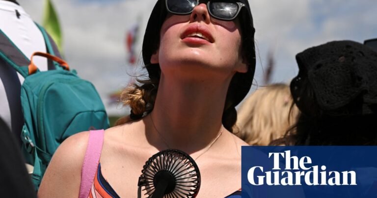 Festivalgoers fight to keep cool as 30C heatwave hits Glastonbury | Glastonbury 2025