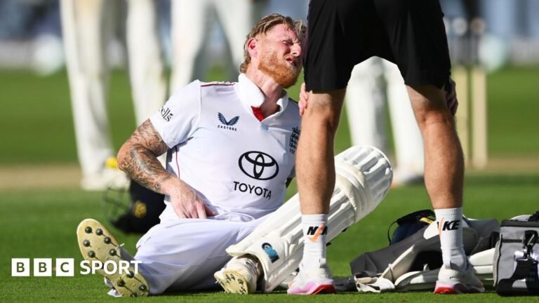 Ben Stokes grabs his groin as he receives treatment