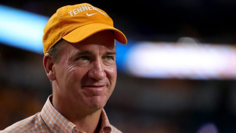 MIAMI GARDENS, FLORIDA - DECEMBER 30: Former Quarterback Peyton Manning looks on prior to the Capital One Orange Bowl between the Tennessee Volunteers and the Clemson Tigers at Hard Rock Stadium on December 30, 2022 in Miami Gardens, Florida. (Photo by Megan Briggs/Getty Images)