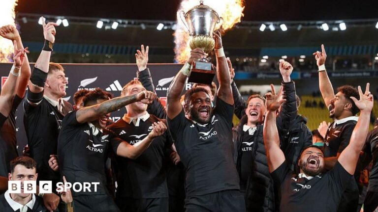 New Zealand lift the trophy after winning the second Test with France in 2025 to clinch a series victory