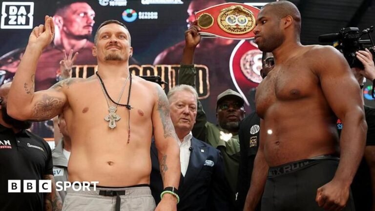 Frank Warren gets between Oleksandr Usyk and Daniel Dubois as the two face off